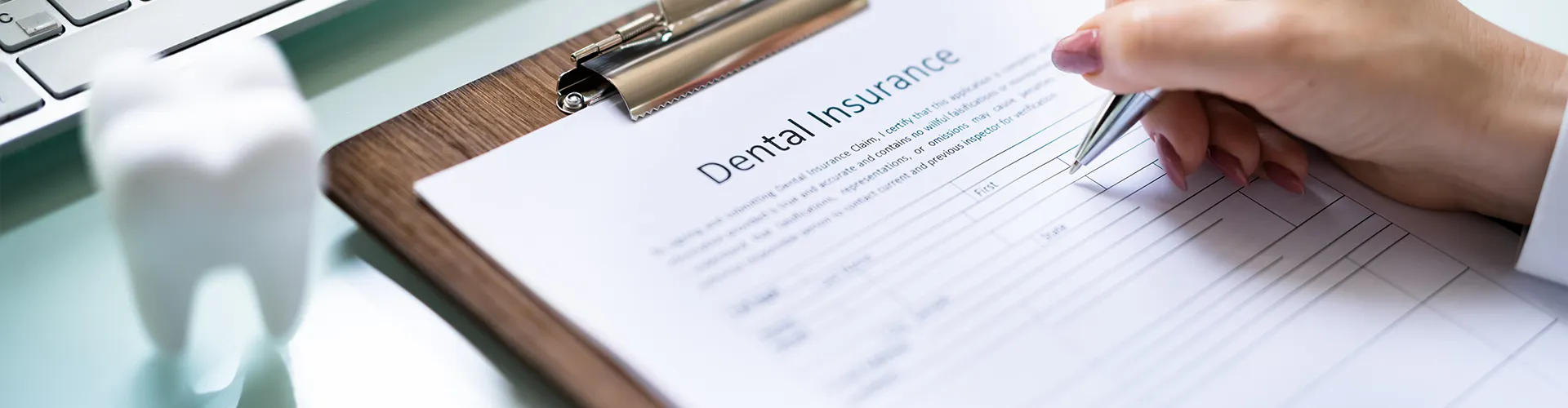 insurance forms on a clipboard