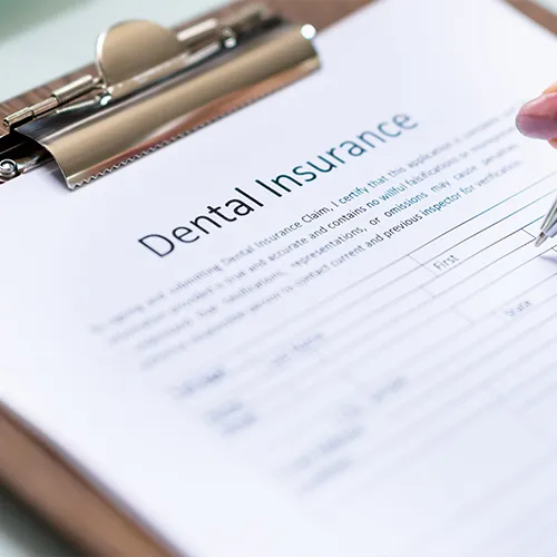 insurance forms on a clipboard
