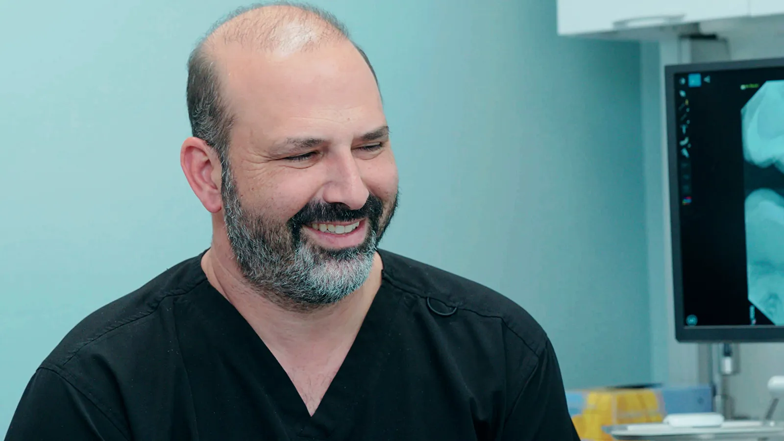 Thumbnail of Dr. James Vartanian smiling.